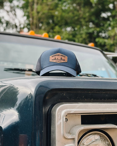 Adventure Awaits Trucker Hat
