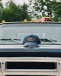 Adventure Awaits Trucker Hat